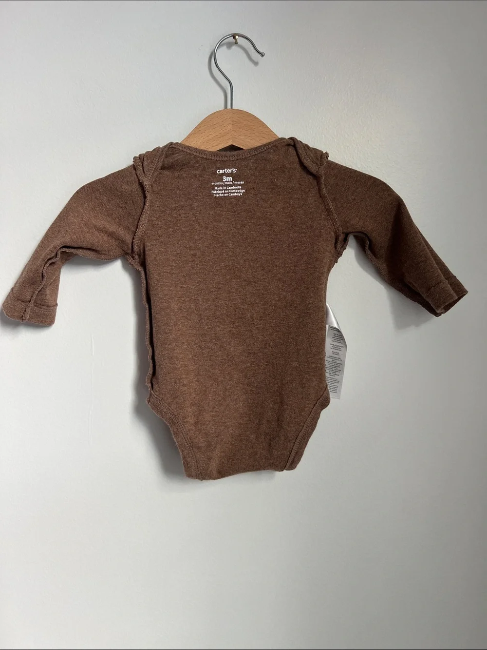 Carter’s | Brown Football-Stitch Long-Sleeve Baby One-Piece Size 3 Months